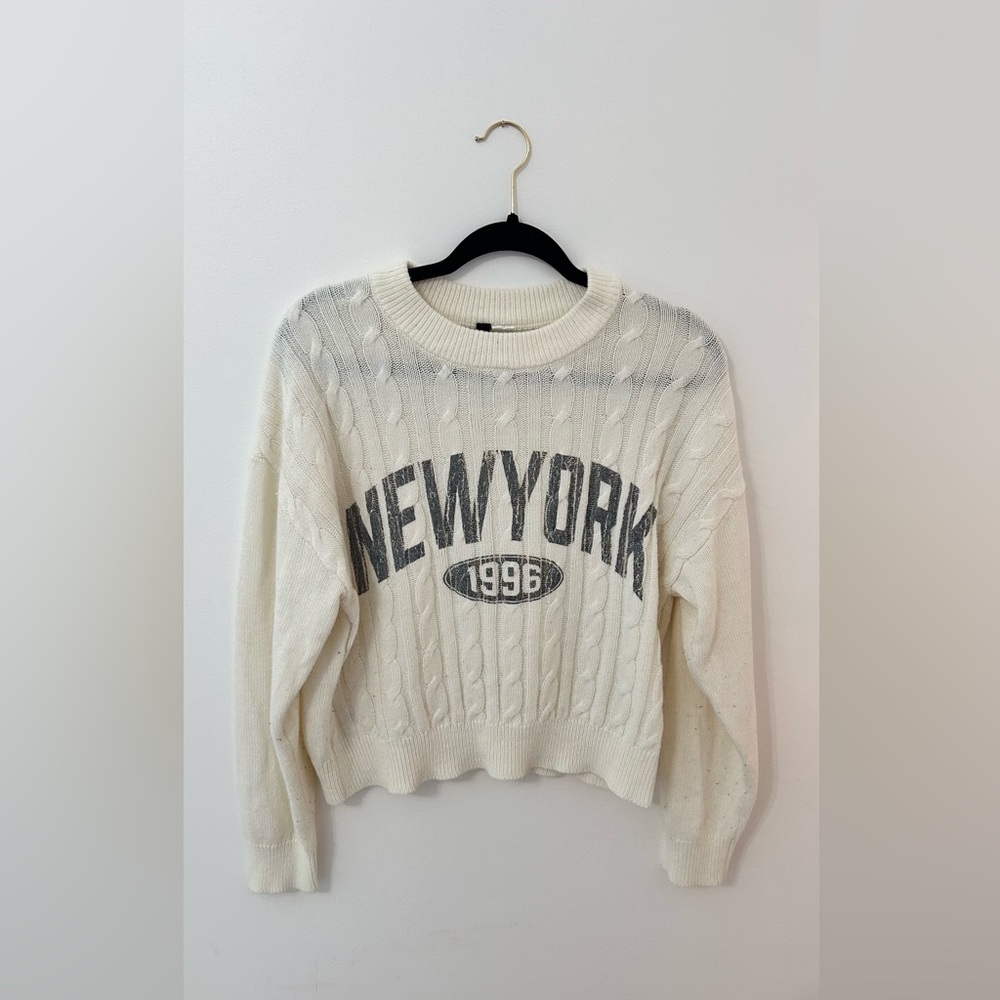 Divided Cream Cable Knit Sweater with Gray Print